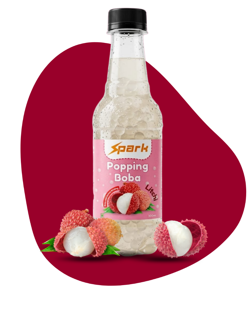 Spark Popping Boba Litchi bottle in a green wooden crate