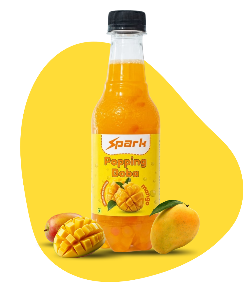 Spark Popping Boba Mango bottle in a green wooden crate